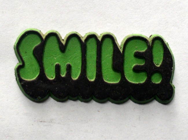 Smile black on green